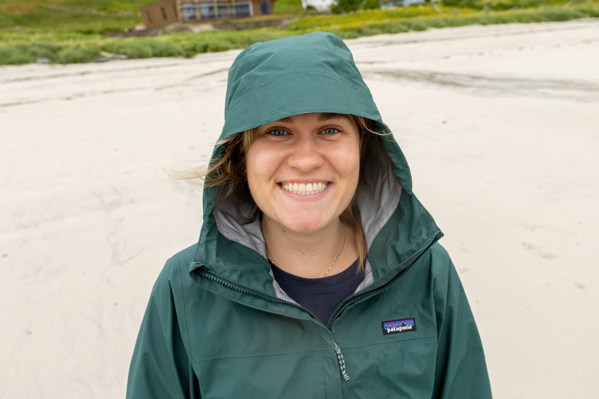 Portrait of a woman in a green rain jacket